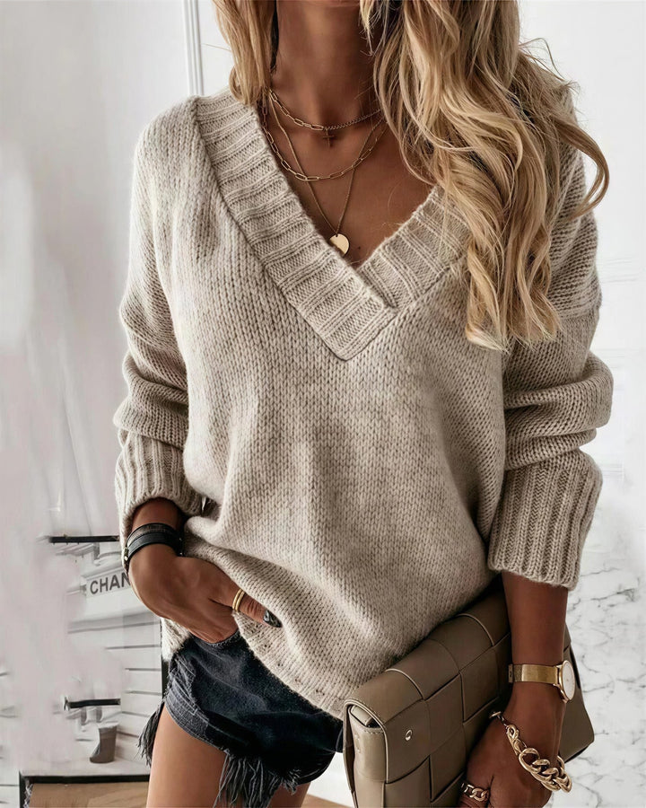 Oversized striktrøje med dyb V-hals