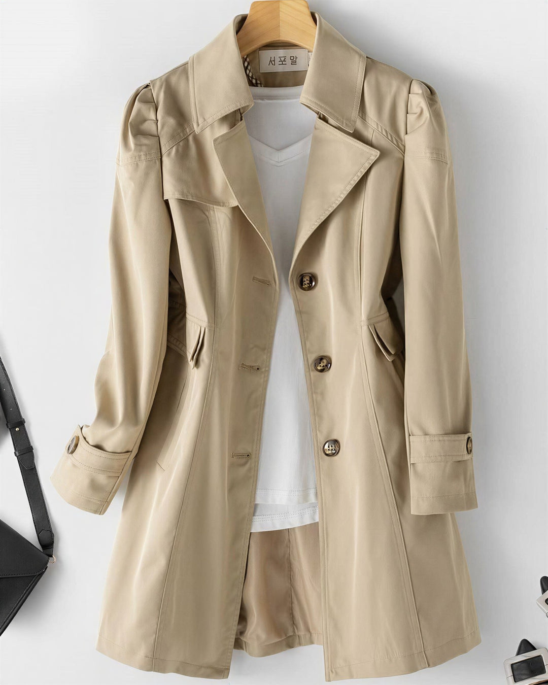 Enkeltradet trenchcoat med pufskuldre