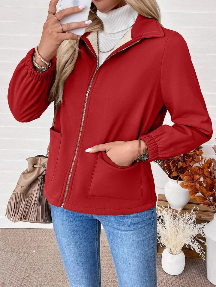 Fleeceforet Jakke Dame med Lynlås og Elastiske Manchetter i pink set fra siden
