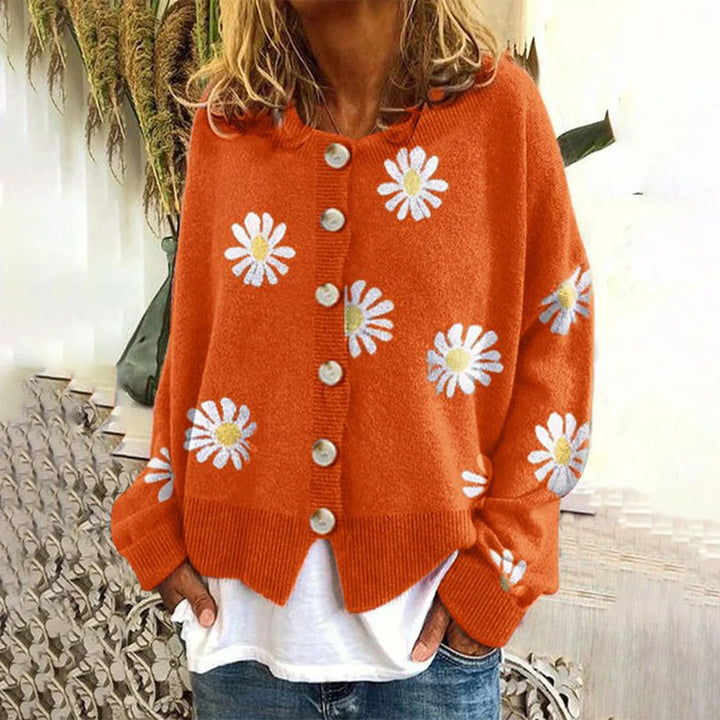 Orange cardigan med margueritprint