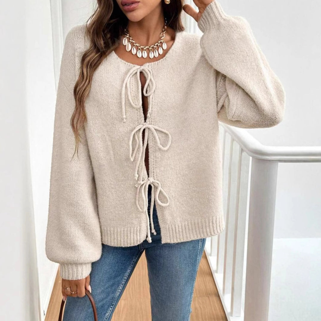 Beige strikcardigan med tre sløjfer