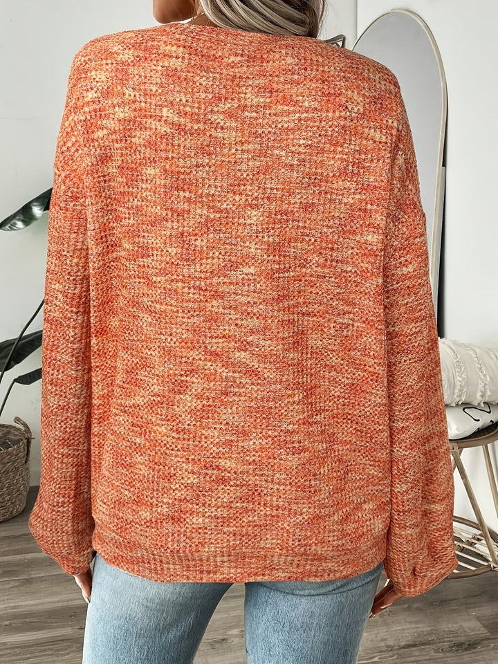 Orange vaffelstriktrøje set bagfra
