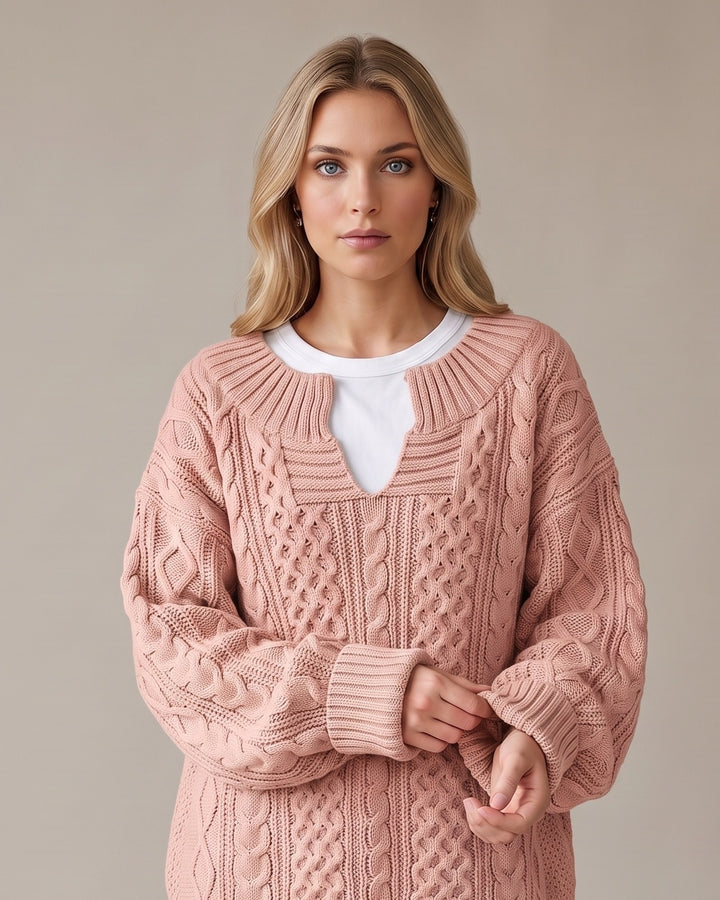 Oversized kabelstrikket striktrøje med V-hals i pink