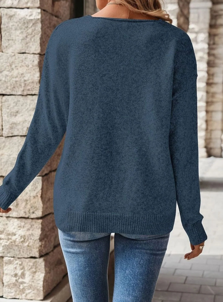 Marineblå striktrøje set bagfra